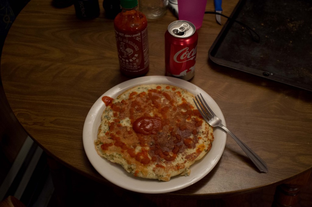 and the maple syrup, put that down too. while you're over by the cupboard, grab the bottle of sriracha, 'cuz that's what you need for a big-boy-size panmeatcake.